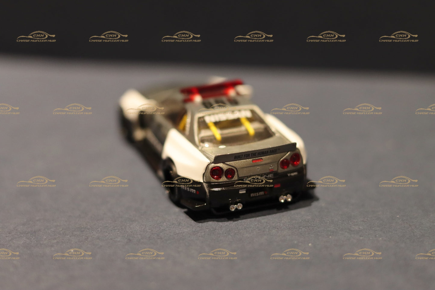 MINI GT x Kaido House #120 Nissan Skyline GT-R R34 Kaido Works (V2 Aero) Police Chase