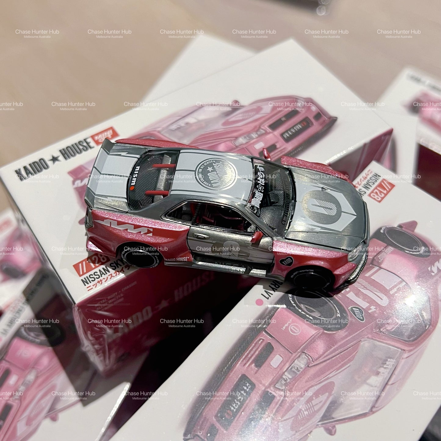 MINI GT x Kaido House #128 Nissan Skyline GTR(R34) Kaido Racing Factory V1 Chase